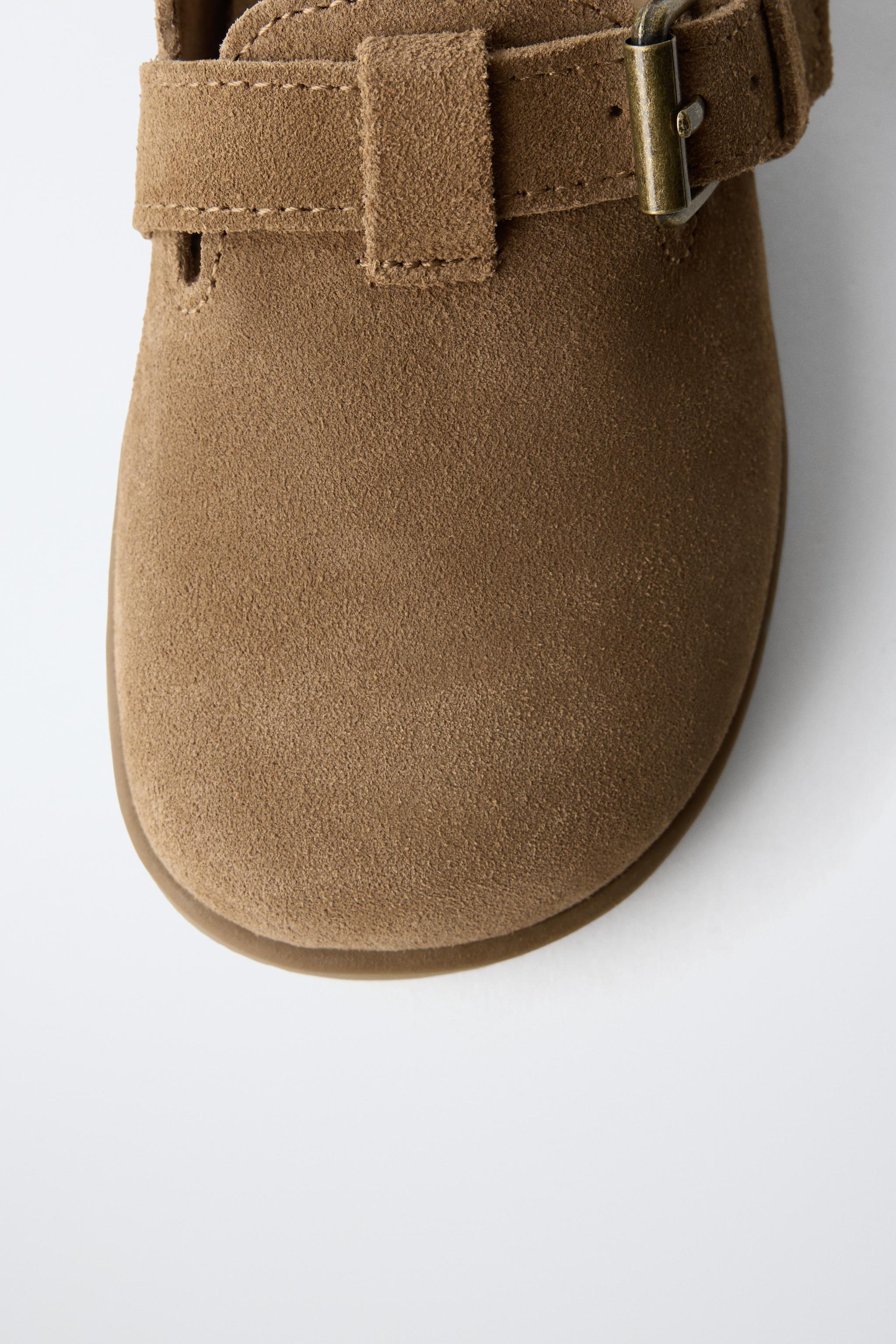 SABOTS EN CUIR